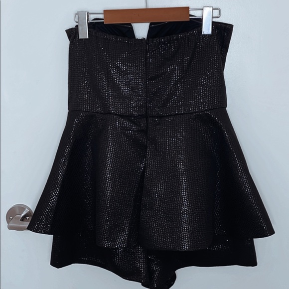 This is a one piece sexy jumper. Black snake skin very comfortable very soft. - Picture 2 of 4